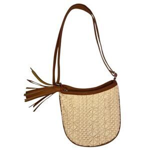 Cream and brown shoulder bag or crossbody purse with adjustable strap and tassel